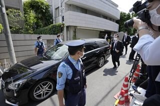 Japan mourns as Abe's body arrives in Tokyo