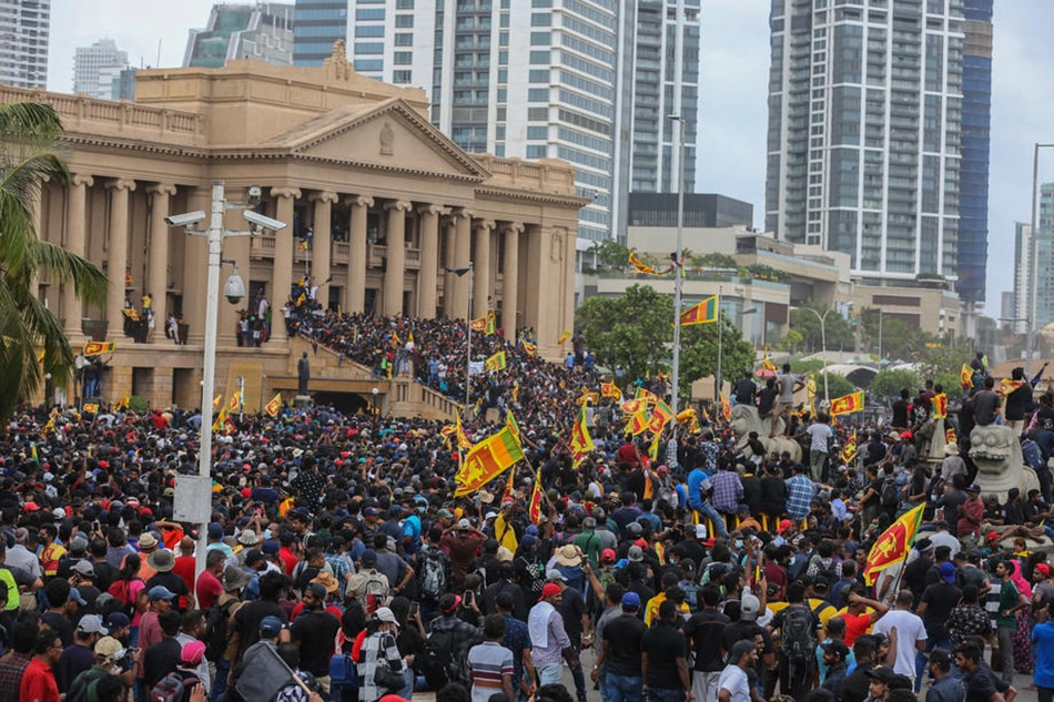 Protesters shout slogans inside the President secretariat premises during the anti-government protest in Colombo, Sri Lanka, 09 July 2022. Chamila Karunarathne, EPA-EFE