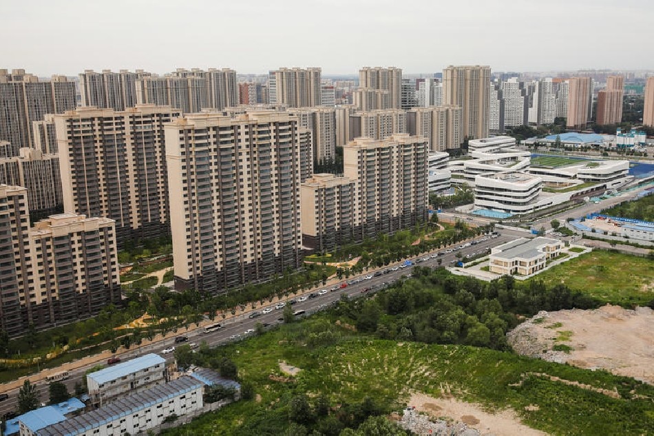 Residential buildings in Beijing, China, 15 July 2022. Wu Hao, EPA-EFE