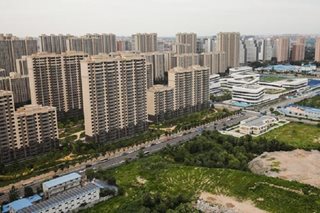 China bond defaults hit $20-B as property sector on edge