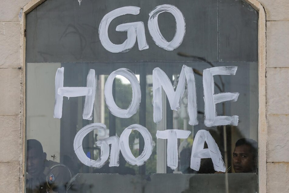A protest slogan written on a window near the President's House following the resignation of Gotabaya Rajapaksa as president, in Colombo, Sri Lanka, on July 15, 2022. Chamila Karunarathne, EPA-EFE/file