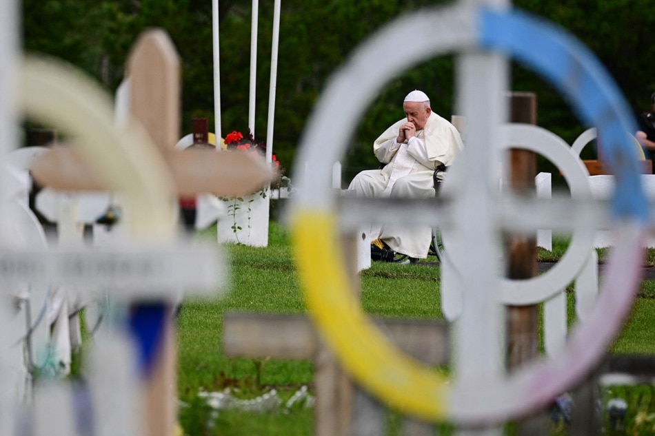 Pope Francis visits the Ermineskin Cree Nation Cemetery in Maskwacis, south of Edmonton, western Canada, on July 25, 2022. Vincenzo Pinto. AFP/File 