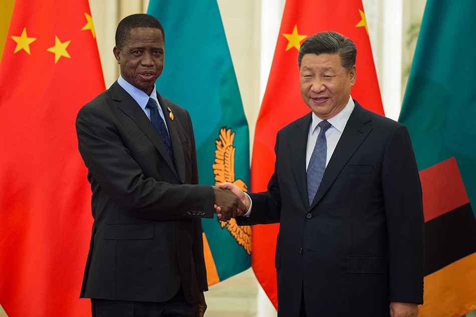 Zambia's President Edgar Lungu (L) shakes hands with China's President Xi Jinping (R) before their bilateral meeting at the Great Hall of the People, Beijing, China, 01 September 2018. Lungu is in China for the Forum on China-Africa Cooperation which will be held between 03 to 04 September Beijing. EPA-EFE/NICOLAS ASFOURI / POOL