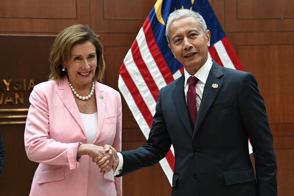  US Speaker of the House Nancy Pelosi (L) and her counterpart Azhar Azizan Harun (R) pose for photograph at Parliament building in Kuala Lumpur, Malaysia, on August 2, 2022. EPA-EFE/Nazri Rapaai/Handout