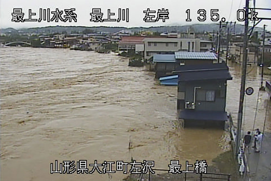  This video grab released by the Ministry of Land, Infrastructure, Transport and Tourism Tohoku Regional Development Bureau via Jiji Press shows floods at the Mogami river in Oe city, Yamagata Prefecture, northeastern Japan, Aug. 4, 2022. The Japan Meteorological Agency issued the highest level rain alert in northeastern Japan as large areas of the region are hit by heavy rainfalls. Ministry of Land, Infrastructure, Transport and Tourism/EPA-EFE
