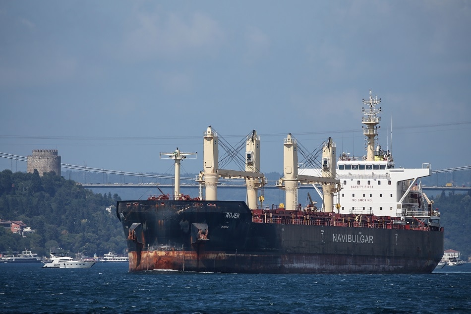 Malta-flagged cargo ship Rojen, that left the Ukrainian port of Chernomorsk with grain shipment for export, sails through Bosphorus in front of the Fatih Sultan Mehmet Bridge after an inspection in Istanbul, Turkey, 07 August 2022. Rojen, which carries 13 thousand tons of corn, sail to Britain. A safe passage deal was signed between Ukraine and Russia for export Ukraine grain on 22 July in Istanbul. EPA-EFE/ERDEM SAHIN
