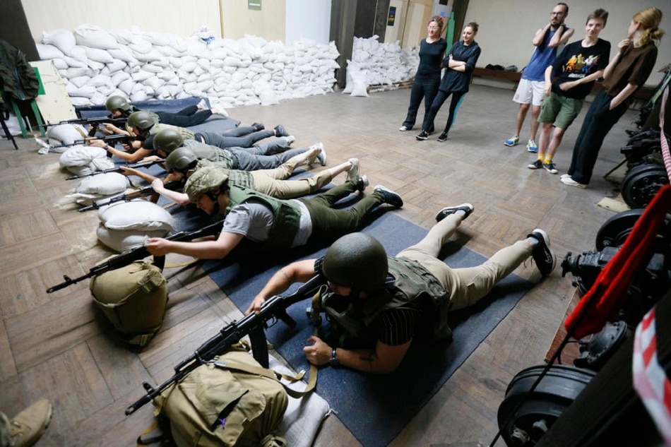 Ukrainians take part in a military training for civilians to learn the use of weapons and tactics of fighting in Odesa, southern Ukraine, June 18, 2022. STR, EPA-EFE