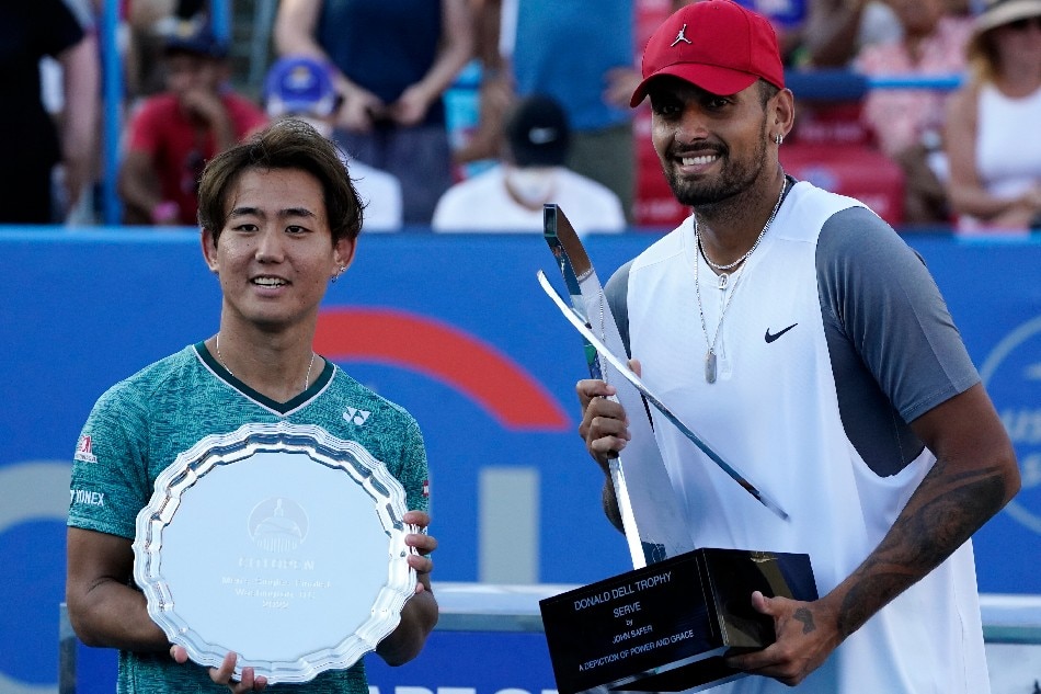 Nick Kyrgios (R) of Australia and Yoshihito Nishioka (L) of Japan pose for photographs after their men's singles final match at the Citi Open ATP tennis tournament at the Rock Creek Park Tennis Center in Washington, DC, USA, 07 August 2022. Will Oliver, EPA-EFE