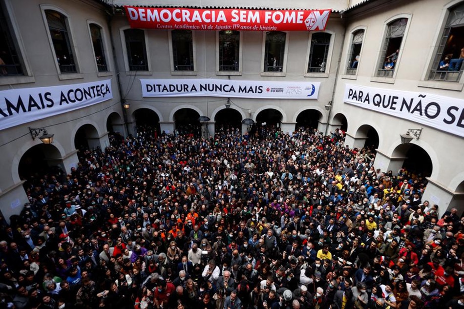 Hundreds of Brazilians gather to read pro-democracy manifestos in the framework of the attacks by the President of Brazil Jair Bolsonaro on the electoral process, at the Law School of the University of Sao Paulo, Brazil, August 11, 2022. Fernando Bizerra, EPA-EFE