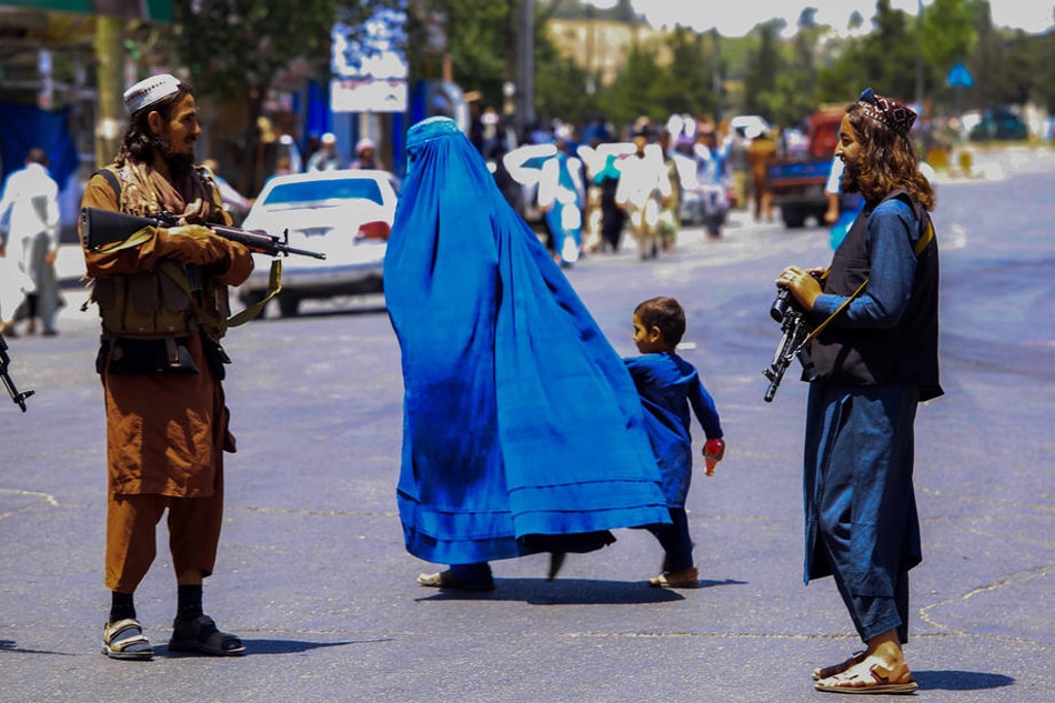 Taliban security stand guard in Kabul, Afghanistan, August 11, 2022. EPA-EFE stringer