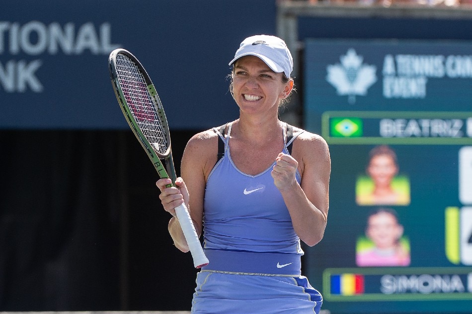 Simona Halep of Romania celebrates her victory against Beatriz Haddad Maia of Brazil during the final of the National Bank Open women's tennis tournament in Toronto, Canada, 15 August 2022. Eduardo Lima, EPA-EFE