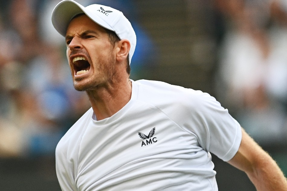 Andy Murray of Great Britain celebrates winning the third set in the men's second round match against John Isner of the US at the Wimbledon Championships, in Wimbledon, Britain, 29 June 2022. File photo. Neil Hall, EPA-EFE