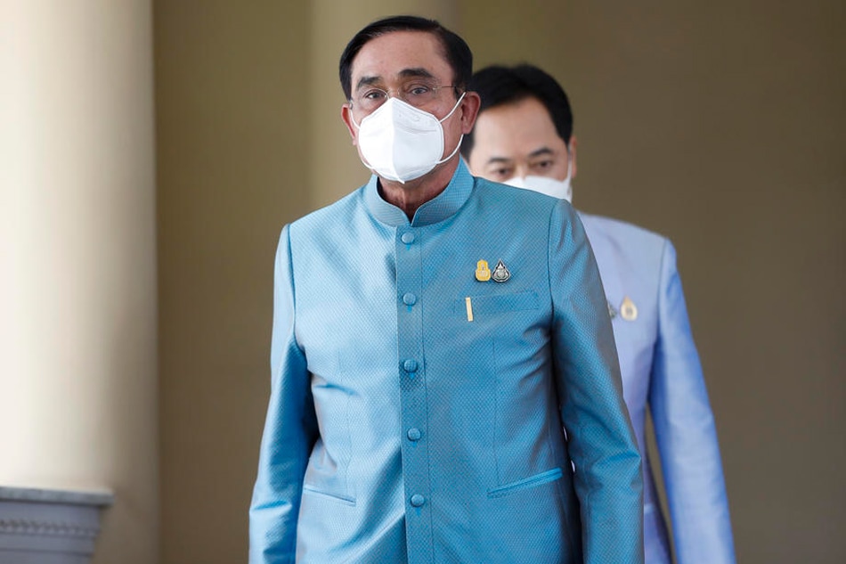 Thai Prime Minister Prayut Chan-o-cha leaves after a weekly cabinet meeting at the Government House in Bangkok, Thailand, Aug. 23, 2022. The prime minister is facing calls to step down by Aug. 24, 2022. According to Thailand's Constitution, a prime minister should not hold office for more than 8 years. While opposition parties point out Prayut's 8-year term started when he assumed premiership in August 2014 after leading a coup d'etat, his supporters claim his tenure began with the enforcement of the new Constitution in April 2017. A third group says the 8 years should instead be counted from the moment he was elected prime minister in the March 2019 elections. Rungroj Yongrit, EPA-EFE