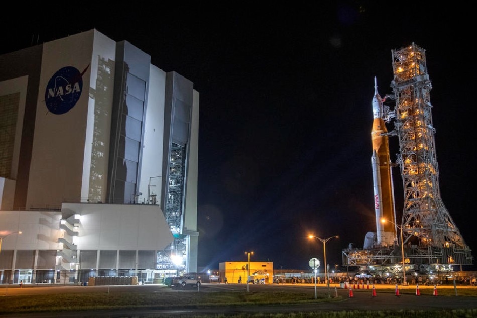 The SLS rocket with an Orion capsule, part of the Artemis 1 mission, is being transported from the NASA’s Vehicle Assembly Building to pad 39B at Kennedy Space Center in Merrit Island, Florida, USA, Aug. 16, 2022. The Artemis 1 mission is an uncrewed test flight of the Orion spacecraft and the first launch of the SLS. The Artemis is an ongoing space mission run by NASA with the goal of landing the first female astronaut and first astronaut of color on the Moon. It is the US space agency's first crewed Moon mission since Apollo 17 in 1972. Cristobal Herrera-Ulashkevich, EPA-EFE 