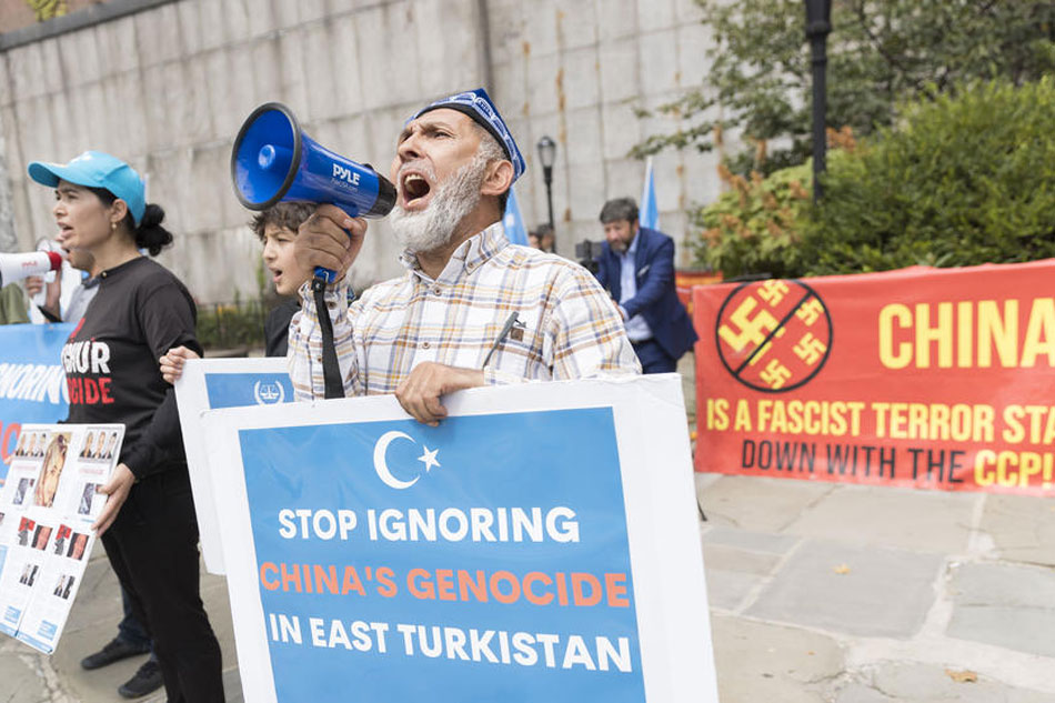 Members of area Uyghur and Kazakh communities gather for a protest near United Nations headquarters in an effort to draw attention to an upcoming United Nations report on human rights violations in China’s Xinjiang region in New York, New York, USA, July 26, 2022. Justin Lane, EPA-EFE 