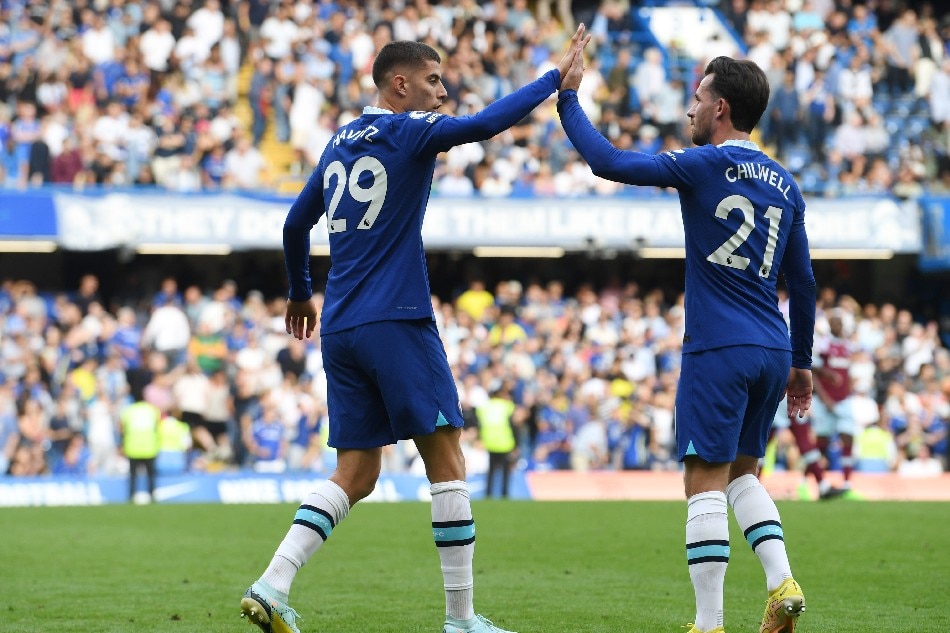 Chelsea's Kai Havertz (L) reacts with team-mate Ben Chilwell after scoring the 2-1 winning goal during the English Premier League soccer match between Chelsea FC and West Ham at the Stamford Bridge in London, Britain, 03 September 2022. Neil Hall, EPA-EFE