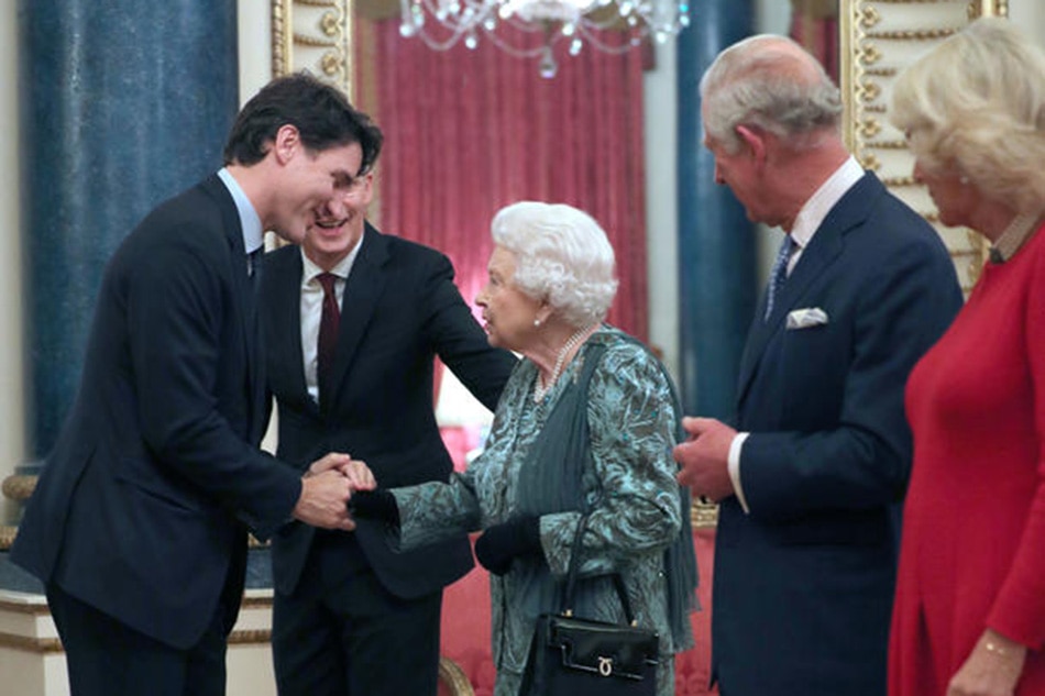 Queen Elizabeth II; Charles, Prince of Wales; and Camilla, Duchess of Cornwall welcome Canadian Prime Minister Justin Trudeau during a reception at Buckingham Palace, London, as leaders gather to mark 70 years of the alliance during the NATO Summit in London, December 3, 2019. Yui Mok, EPA-EFE/file