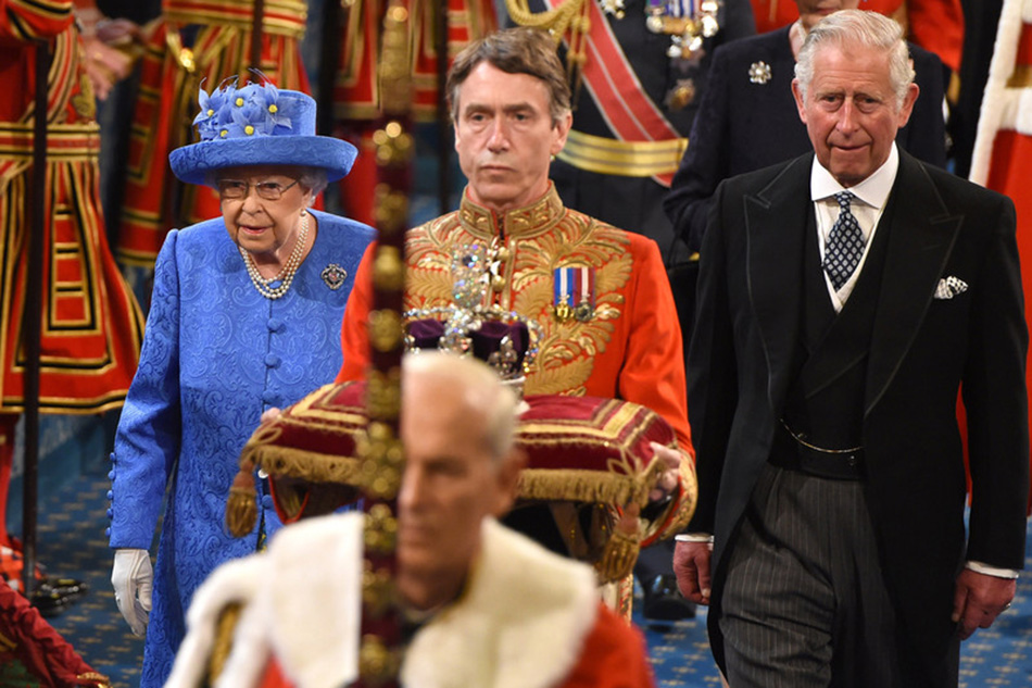 Queen Elizabeth II is flanked by her son, HRH Prince Charles, The Prince of Wales, as they arrive for the annual ceremony of the State Opening of Parliament, marking the formal start of the parliamentary year in London, June 21, 2017. Stringer/Pool UK Out/EPA/file