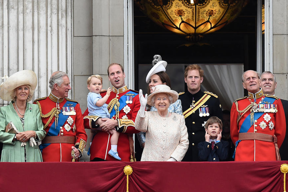 A picture dated June 13, 2015 shows Queen Elizabeth II and members of the Royal Family on the balcony of Buckingham Palace following the traditional Trooping the Colour Ceremony in London. From left are: Camilla, Duchess of Cornwall; Prince Charles; Prince George; Prince William; Duke of Cambridge; Catherine, Duchess of Cambridge; Prince Harry; Prince Philip, Duke of Edinburgh; and Prince Andrew. Boy bottom right is unidentified. Facundo Arrizabalaga, EPA-EFE/file