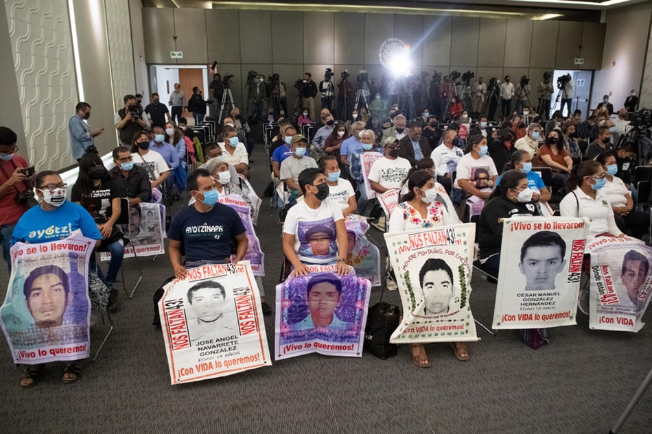 Parents and friends of the 43 disappeared normalistas listen to the presentation of the Third Ayotzinapa Report at the Interior Ministry of Mexico City, March 28, 2022. Isaac Esquivel, EPA-EFE/file