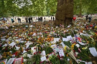 Flowers left for Queen Elizabeth to be composted