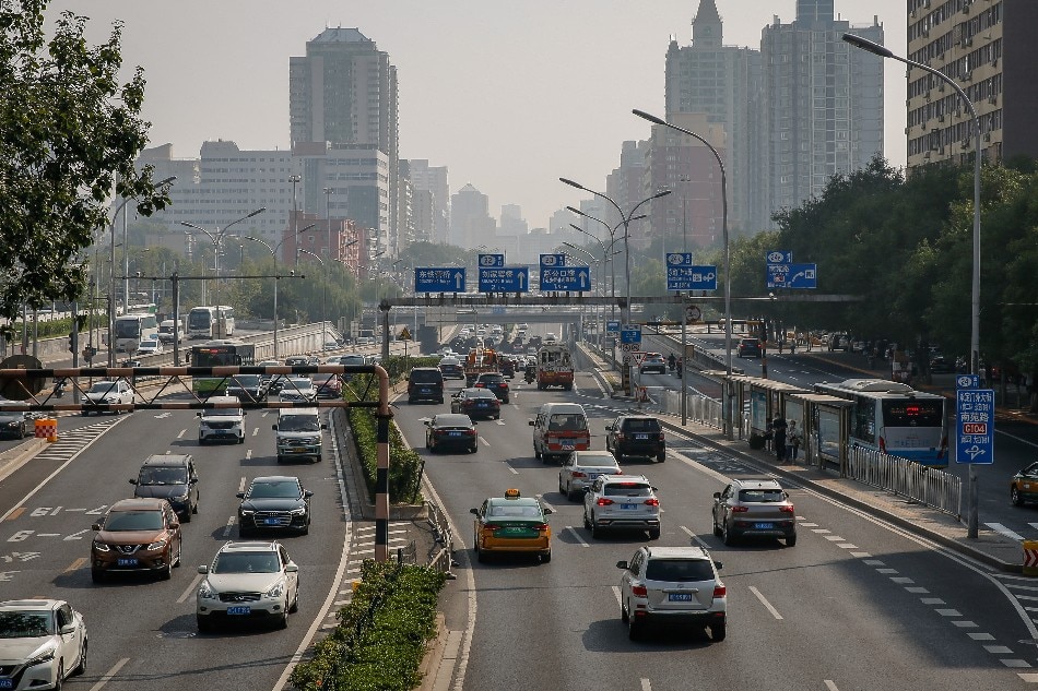 Vehicles travel along a road in Beijing, China, Sept. 16, 2022. China continues its economic recovery as fixed-asset investment rose by 5.8 percent in the January-August period and industrial production rose by 4.2 percent from a year earlier. Retail sales rose by 5.4 percent from last month as the jobless rate stood at 5.3 percent down from 5.4 percent in July. Mark Cristino, EPA-EFE