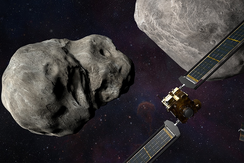 An undated handout picture made available by the National Aeronautics and Space Administration (NASA) shows an illustration of NASA's Double Asteroid Redirection Test (DART) spacecraft prior to impact at the Didymos binary asteroid system (September 26, 2022). EPA-EFE