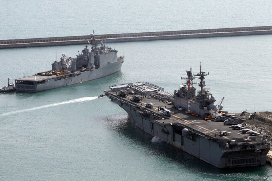 The amphibious assault vessel USS Bonhomme Richard and the USS Ashland leave the southeastern port of Busan, South Korea, March 7, 2016, to take part in a combined landing exercise with South Korean forces. Yonhap South Korea out, EPA/file