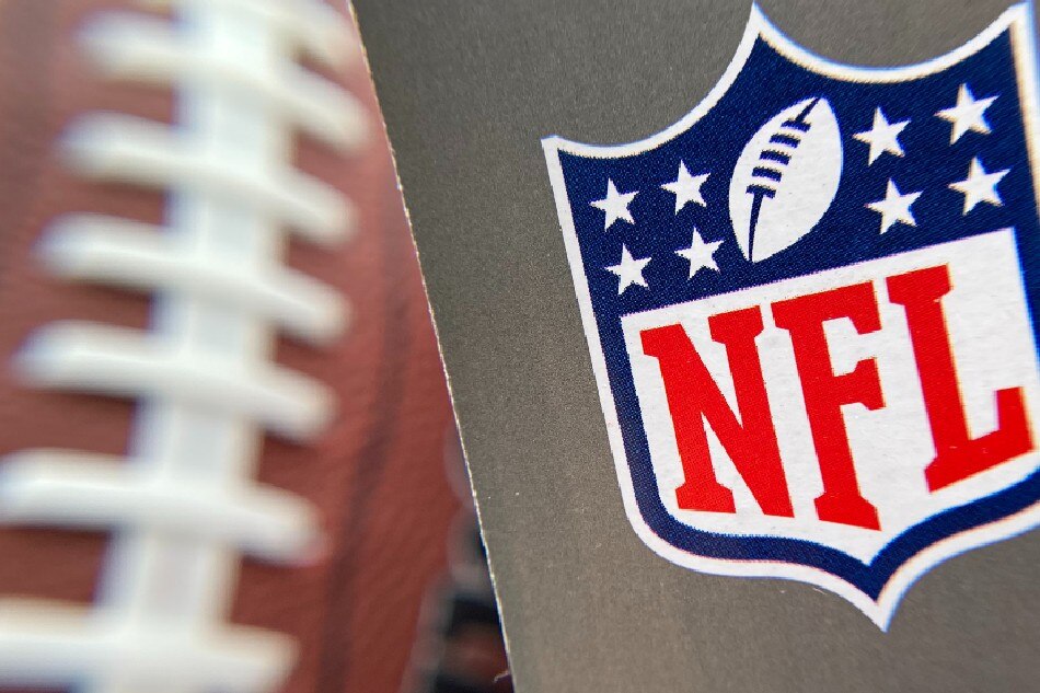 The NFL logo is seen on a football packaging in Los Angeles on August 24, 2020. File photo. Chris Delmas, AFP