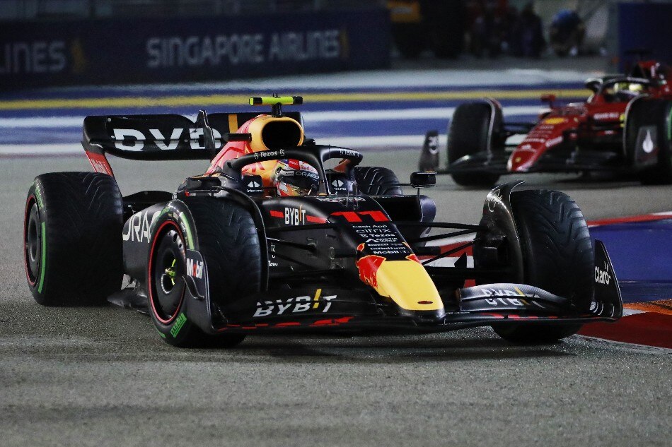 Mexican Formula One driver Sergio Perez of Red Bull Racing in action during the Singapore Formula One Grand Prix at the Marina Bay Street Circuit, Singapore, 02 October 2022. EPA-EFE/TOM WHITE