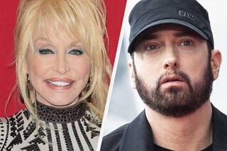 'I'm a rock star now!': Dolly, Eminem join Rock Hall of Fame