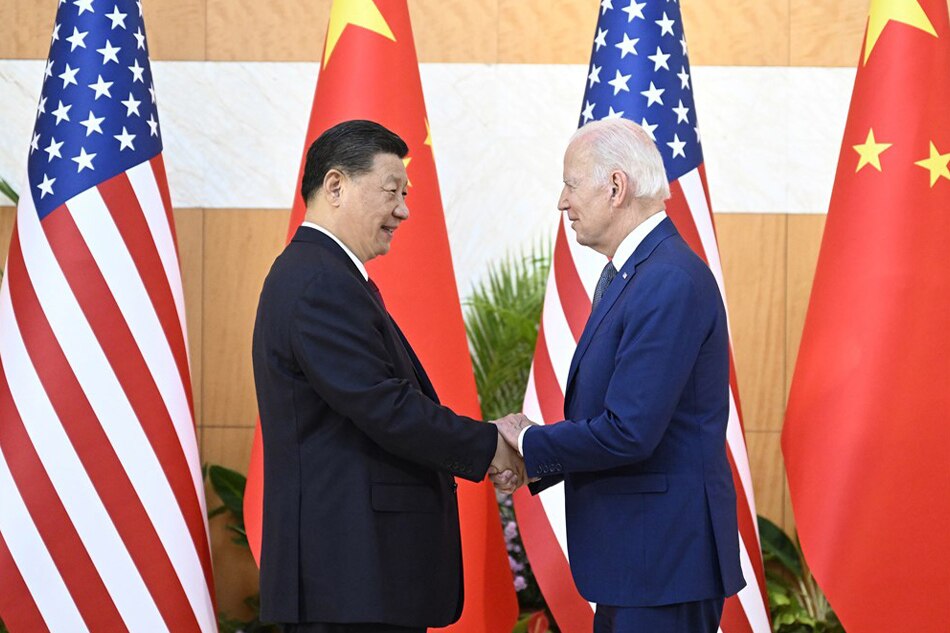 Chinese President Xi Jinping greets his US counterpart Joe Biden before their meeting in Bali, Indonesia, November 14, 2022, one day ahead of the G20 Summit. Li Xueren, Xinhua/EPA-EFE
