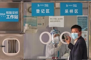 Chinese cities cancel mass COVID tests in easing of measures