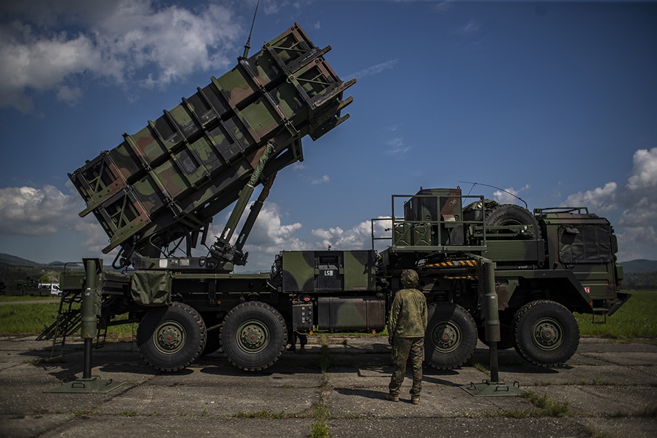 A German soldier looks on as he shows how it works at the launching station of NATO's Patriot missile air defense system operated by German army unit Flugabwehrraketengruppe 26 (Air Defense Artillerie) placed at Sliac airbase in Sliac, central Slovakia, 10 May 2022. A Dutch-German air and missile defense forces deployed Patriot system in spring 2022 to reinforce defense capabilities on Eastern NATO border following Russia's military invasion in Ukraine. EPA-EFE/MARTIN DIVISEK