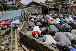 Praying near the shelter