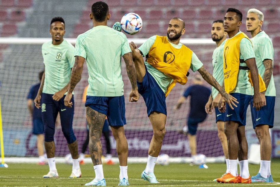 Brazil's Dani Alves (C) in action during a training session of the national soccer team of Brazil in Doha, Qatar, 27 November 2022. Brazil will face Switzerland in their second group G match of the FIFA World Cup 2022 on 28 November. Martin Divisek, EPA-EFE