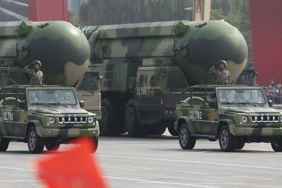 Military vehicles carrying the DF-41 intercontinental nuclear missile roll past Tiananmen Square during a military parade marking the 70th anniversary of the founding of the People's Republic of China, in Beijing, China, 01 October 2019. China commemorates the 70th anniversary of the founding of the People's Republic of China on 01 October 2019 with a grand military parade and mass pageant. EPA-EFE/Wu Hong/File