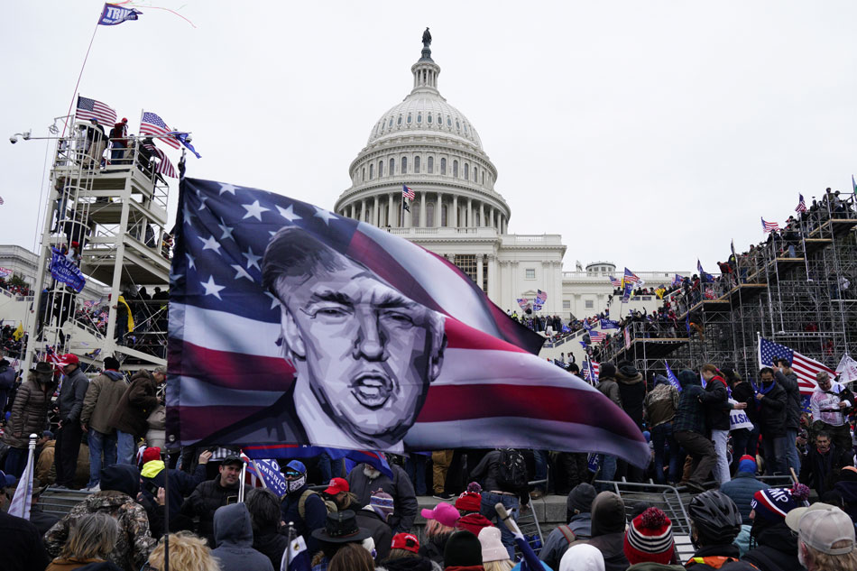 Pro-Trump protesters storm the grounds of the US Capitol, in Washington, DC, USA, Jan. 6, 2021. Various groups of Trump supporters have broken into the US Capitol and rioted as Congress prepares to meet and certify the results of the 2020 US Presidential election. Will Oliver, EPA-EFE/File