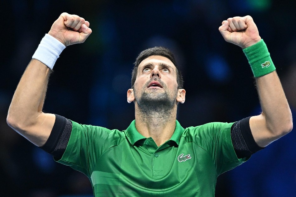 Novak Djokovic of Serbia celebrates after winning against Casper Ruud of Norway the singles final of the Nitto ATP Finals 2022 tennis tournament at the Pala Alpitour arena in Turin, Italy, 20 November 2022. Alessandro di Marco, EPA-EFE