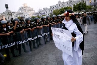 Peru president under investigation after dozens killed in protests