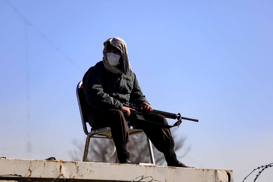 Taliban stand guard outside Kabul University in Kabul, Afghanistan, 21 December 2022. The ruling Taliban has banned women from attending university in Afghanistan, according to an order issued on 20 December 2022. EPA-EFE/STRINGER