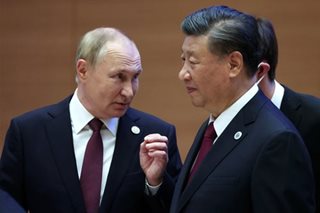 Putin tells Xi he wants to ramp up military cooperation