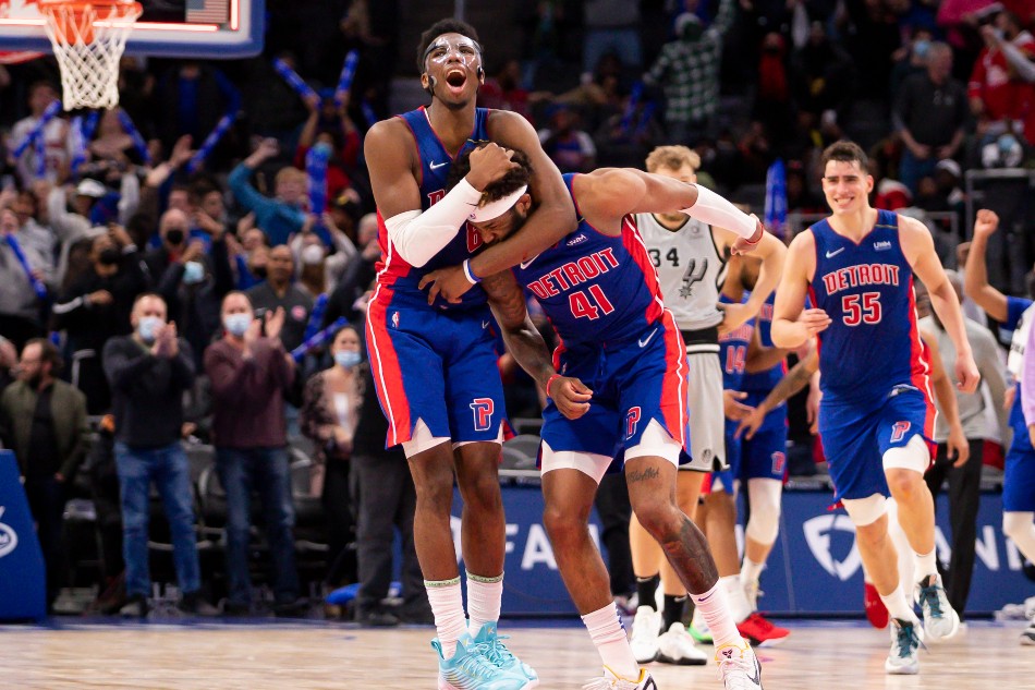 Detroit Pistons guard Hamidou Diallo (6) hugs forward Saddiq Bey (41) after the final buzzer in overtime against the San Antonio Spurs at Little Caesars Arena. Raj Mehta, USA TODAY Sports/Reuters