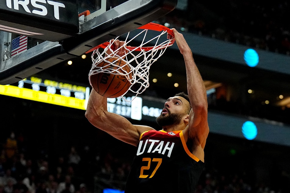 Jazz center Rudy Gobert scores against Golden State on January 1, 2022. Ron Chenoy, USA Today Sports/Reuters