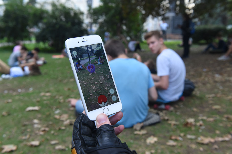 A man plays at the Pokemon GO augmented reality game in central Moscow on August 23, 2016. Agence France-Presse file photo