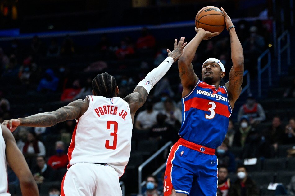 Washington Wizards guard Bradley Beal (3) shoots over Houston Rockets guard Kevin Porter Jr. (3) during the second half at Capital One Arena. Brad Mills, USA TODAY Sports/Reuters.