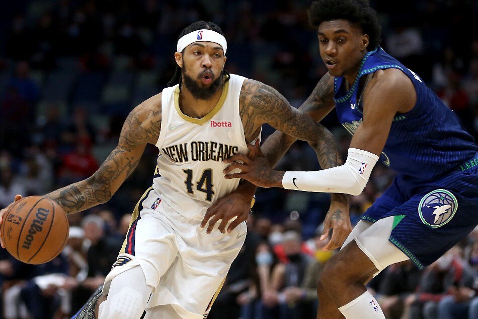 New Orleans Pelicans forward Brandon Ingram (14) drives to the basket defended by Minnesota Timberwolves forward Jaden McDaniels (3) in the second half at the Smoothie King Center. Chuck Cook, USA TODAY Sports/Reuters