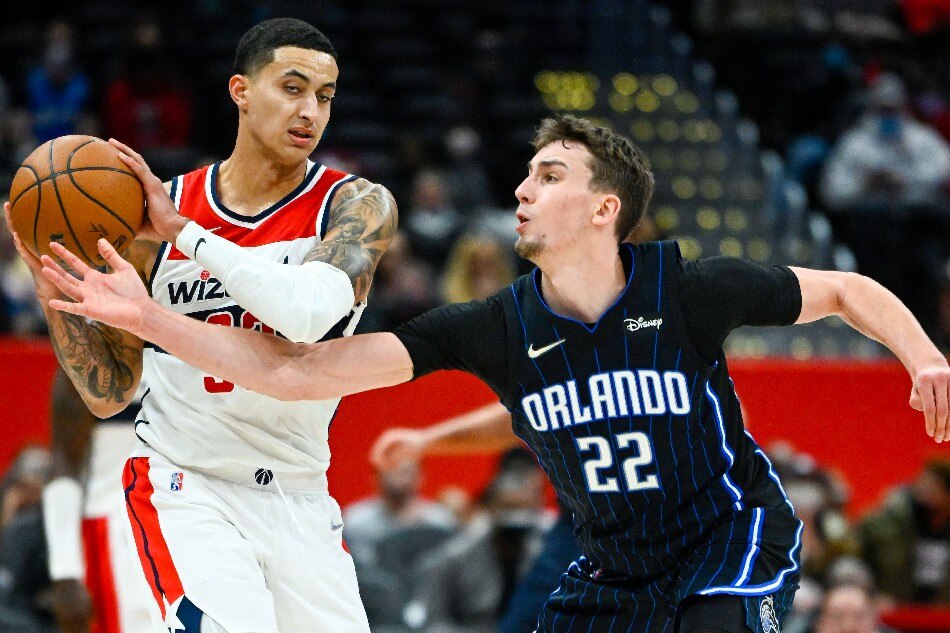 Orlando Magic forward Franz Wagner (22) defends Washington Wizards forward Kyle Kuzma (33) during the second half at Capital One Arena. Brad Mills, USA TODAY Sports/Reuters