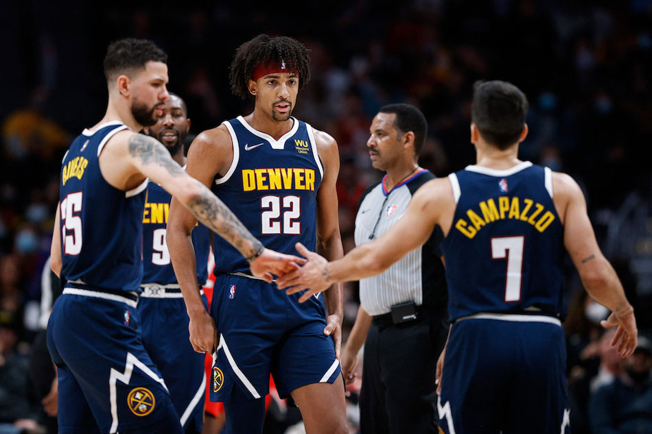  Denver Nuggets forward Zeke Nnaji (22) reacts with guard Austin Rivers (25) and guard Facundo Campazzo (7) against the Portland Trail Blazers at Ball Arena. Isaiah J. Downing, USA TODAY Sports/Reuters