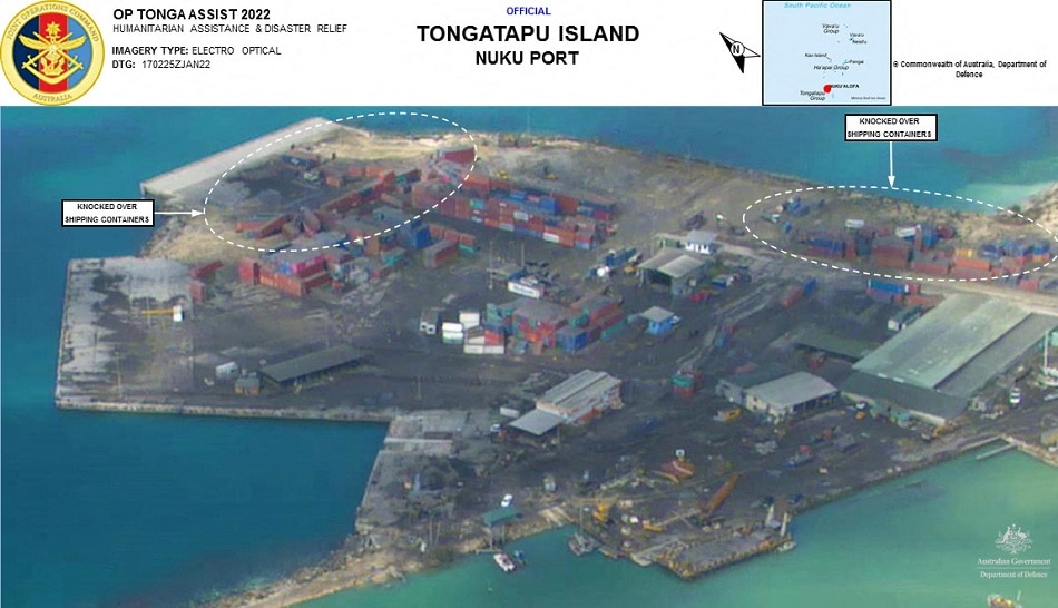 View of tsunami damage after the Pacific island nation was hit after a massive undersea volcanic eruption in Nuku Port, Tongatapu Island, Tonga, released January 18, 2022, in this reconnaissance photo taken from a Royal Australian Air Force P-8A Poseidon maritime patrol aircraft surveillance flight. Australian Department of Defense handout via Reuters